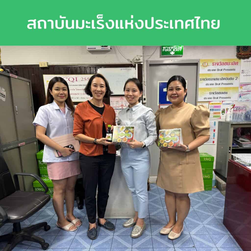 Green and Organic Thailand team promoting organic products and health supplements at the office.